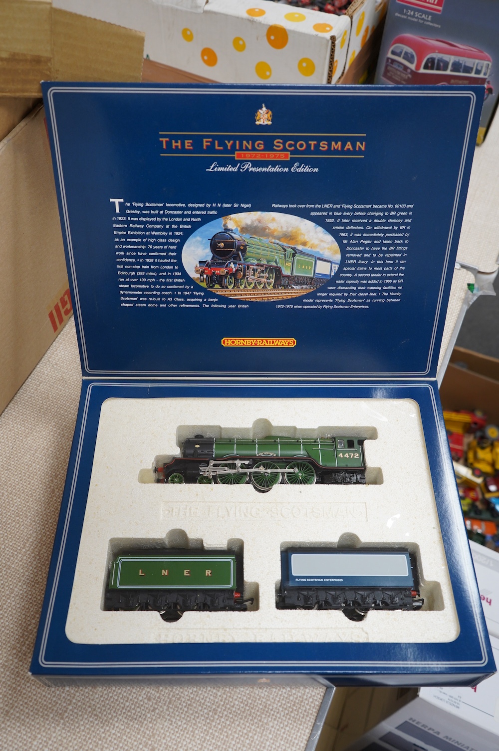 Three boxed Hornby Railways 00 gauge train packs; ‘The Flying Scotsman’ comprising of a Class A3 locomotive with two tenders (R098), together with The Flying Scotsman three coach set (R089), plus an LMS ‘The Royal Scot’